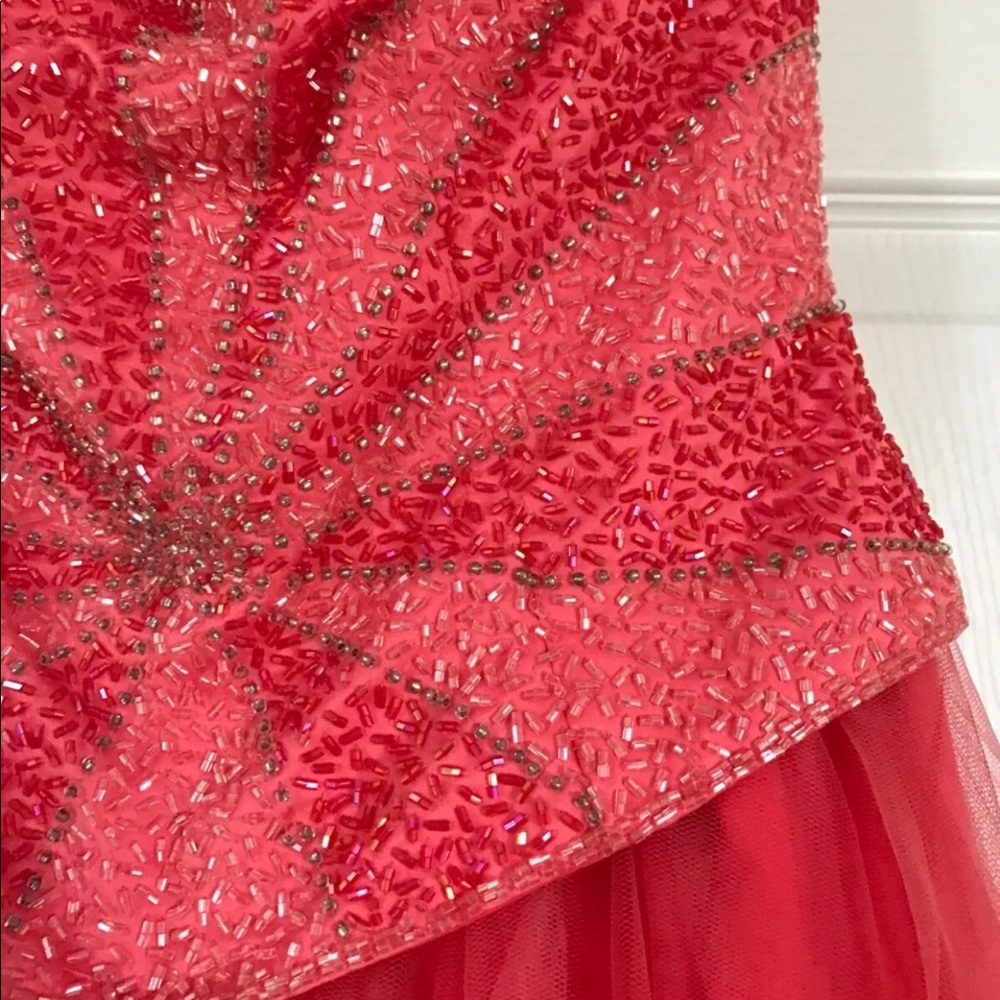 Full, coral prom or other formal dress